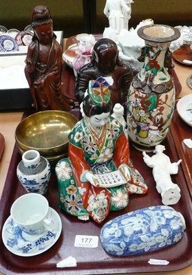Lot 177 - Carved figure of a seated Buddha, carved figure of a deity and other Oriental wares