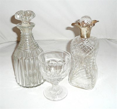 Lot 194 - A glass decanter with silver mount, another glass decanter and a glass