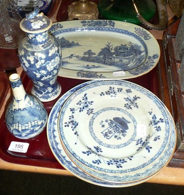 Lot 195 - An 18th century Chinese oval meat plate, three plates, bottle vase and a ginger jar and cover