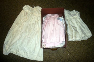 Lot 214 - Assorted children's silk and cotton dresses, pair of kid leather gloves, etc