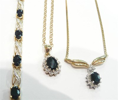 Lot 235 - A sapphire and diamond bracelet and pendants on chains