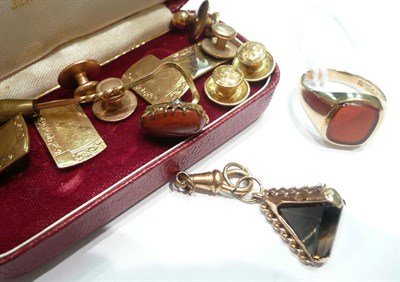 Lot 249 - A pair of 9ct gold cuff-links, a 9ct gold cornelian ring, dress studs, stick pins and a fob