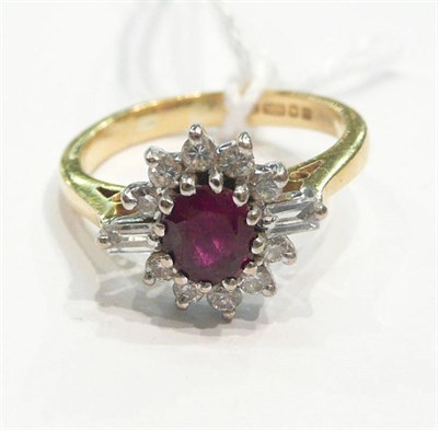 Lot 261 - An 18ct gold ruby and diamond cluster ring