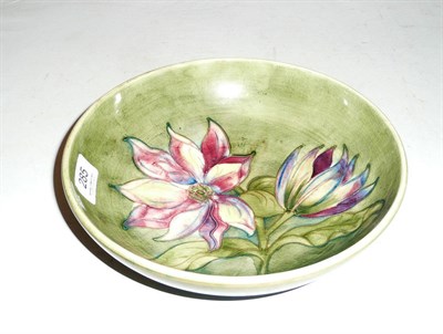 Lot 285 - Moorcroft bowl on a green ground, stamped factory mark and painted monogram