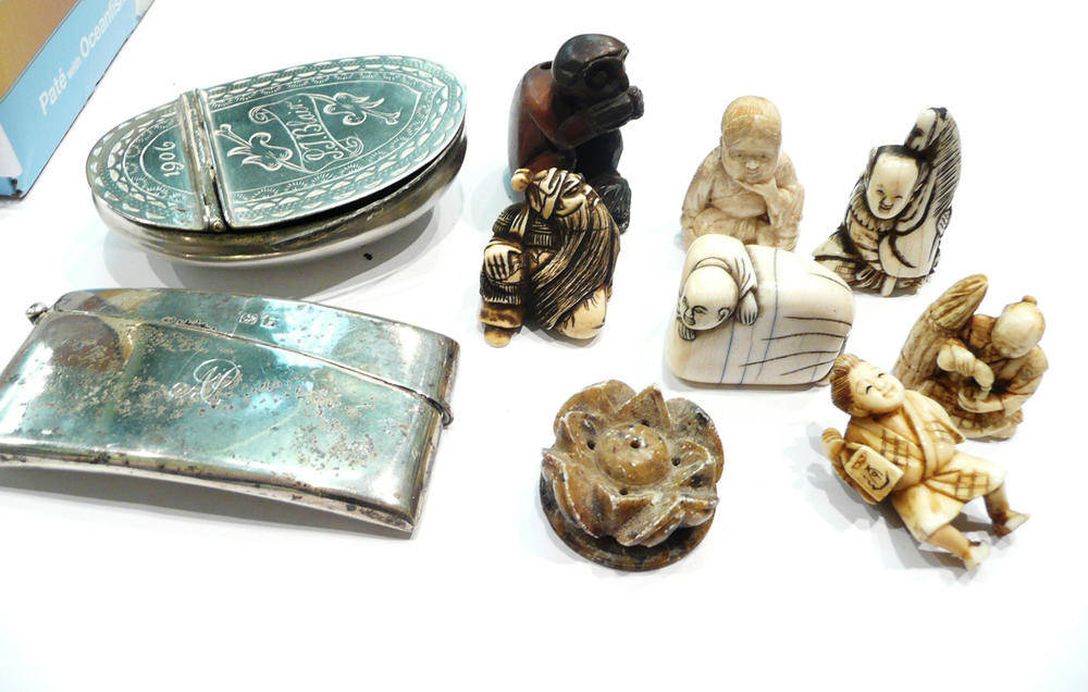 Lot 447 - Six ivory netsuke circa 1910-1930, two other carvings, a silver card case and a snuff box