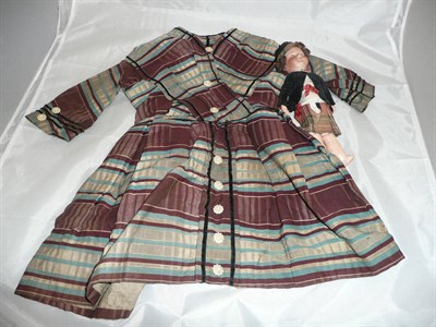 Lot 1 - Late 19th century childs striped dress with carved bone buttons and a German bisque socket head...