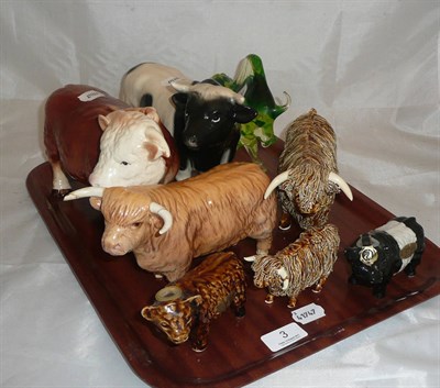 Lot 3 - A Beswick highland bull (a.f.), two Rutherford 'Bull' Whisky decanters and five other figures...