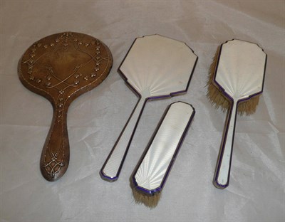Lot 6 - A three piece enamel and silver dressing table set and a silver hand mirror