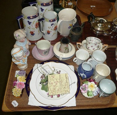Lot 28 - Pair of bisque models of young girls and assorted crockery on two trays