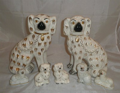 Lot 38 - Pair of Beswick old English dogs, two large modern dogs and three 19th century Staffordshire dogs