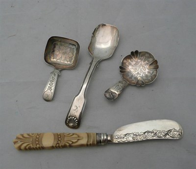 Lot 56 - Three silver caddy spoons and a silver and ivory butter knife