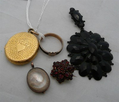 Lot 59 - A brooch, a locket, a French jet pendant and two pieces of mourning jewellery