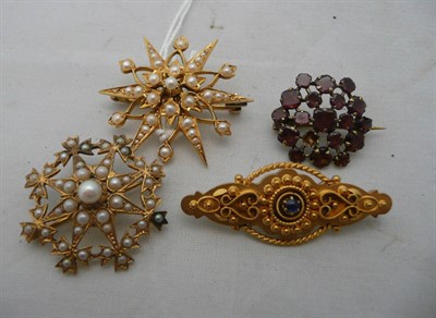 Lot 65 - Two Edwardian seed pearl brooch, garnet brooch and 9ct gold bar brooch (4)