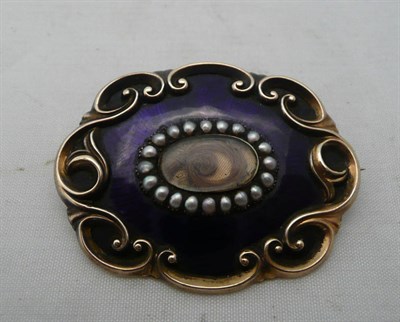 Lot 80 - A Victorian enamel mourning brooch, engraved to back 'E.A.K. 1849', in box