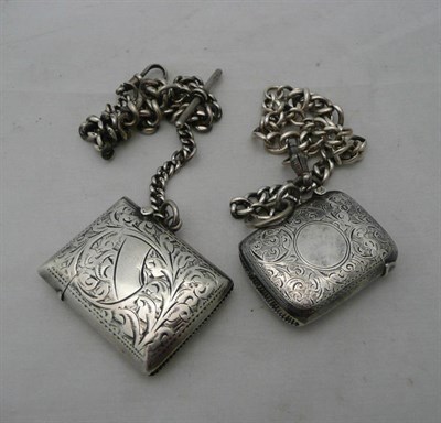 Lot 81 - Two silver vesta cases each with silver chain attached
