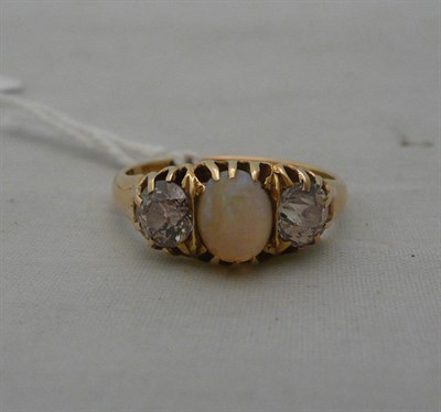 Lot 93 - An 18ct gold opal and diamond ring