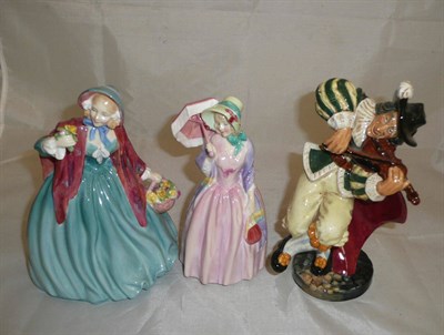 Lot 102 - Three Royal Doulton figures - Miss Demure, Lady Charmain and The Fiddler