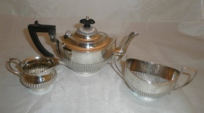 Lot 110 - A matched silver three piece bachelors tea service, 11oz