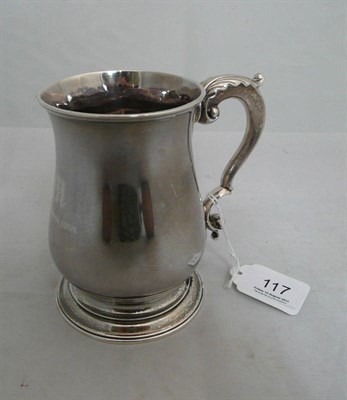 Lot 117 - A Georgian silver mug, later engraved, 13oz approximate weight