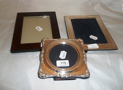 Lot 119 - Two silver photograph frames and a wood effect frame