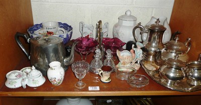 Lot 138 - Cranberry glass double jam dish and a quantity of ceramics and plated wares on a shelf