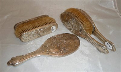 Lot 149 - An Art Nouveau silver five piece dressing table set