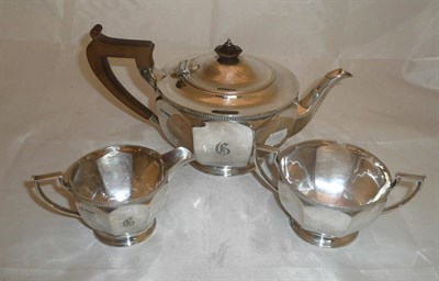 Lot 151 - A three piece silver tea set, 30oz approximate weight