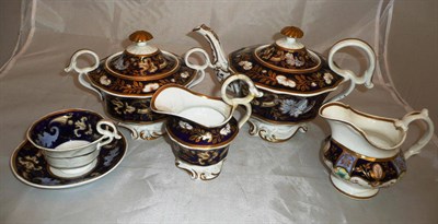 Lot 155 - A 19th century part tea set (a.f.) and a similar jug