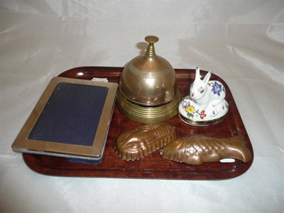 Lot 174 - A Dubarry enamel rabbit box, small silver frame, bell and confectionary moulds