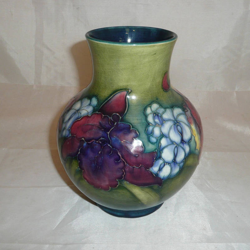 Lot 189 - A Walter Moorcroft orchids and spring