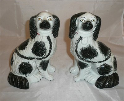 Lot 201 - Pair of Staffordshire 'charcoal' decorative Staffordshire dogs - open legs