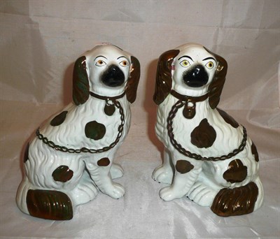 Lot 203 - Pair of 'Copper Lustre' Staffordshire dogs - open leg