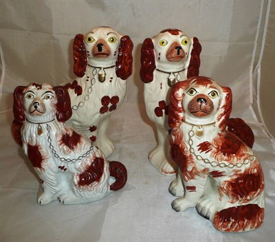 Lot 204 - Four russet Staffordshire dogs