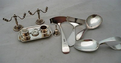 Lot 226 - A miniature inkstand, two miniature candelabra, a pusher and spoon, Sheffield plate caddy spoon and