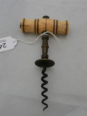 Lot 243 - A bone handled brass corkscrew