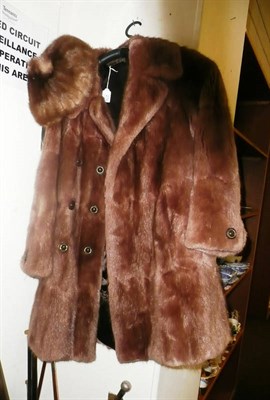 Lot 276 - A fur coat and a fur hat