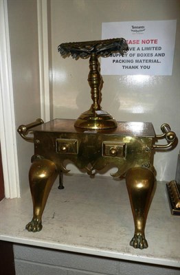 Lot 284 - Brass footman and a brass kettle stand