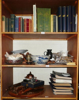 Lot 287 - Elephant hat stand, binoculars, a quantity of books and household items on three selves