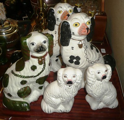 Lot 291 - Pair of Staffordshire dogs, another Staffordshire dog and a pair of small Staffordshire dogs