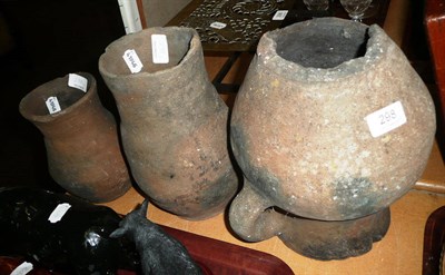 Lot 298 - Three early pottery jugs