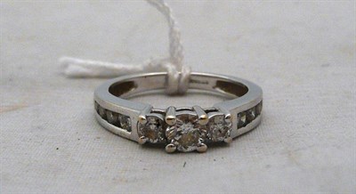 Lot 313 - A gold and diamond ring