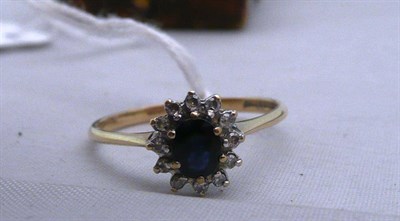 Lot 316 - A 9ct gold sapphire and diamond ring