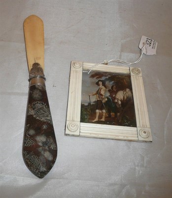 Lot 323 - Ivory paper knife with fossil handle and a miniature