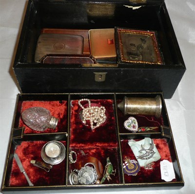 Lot 342 - A jewellery box containing silver cigarette case, silver pepperette, pen knives, jewellery,...