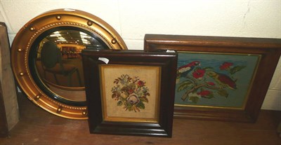 Lot 374 - Gross point needlework parrots,  another and a circular convex mirror