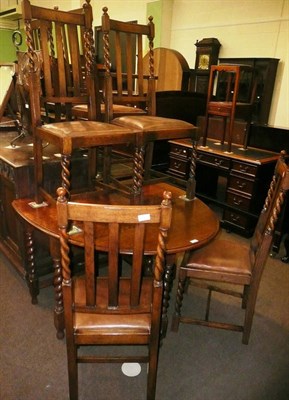 Lot 429 - Oak gateleg table and six chairs