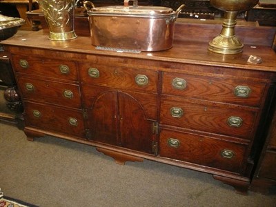 Lot 447 - Georgian oak cross banded dresser base