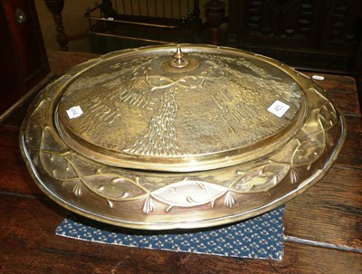 Lot 451 - A brass portable baptismal font with lid