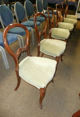 Lot 458 - A set of six Victorian rosewood balloon back salon chairs