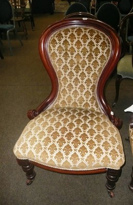 Lot 459 - A Victorian mahogany framed spoon back armchair